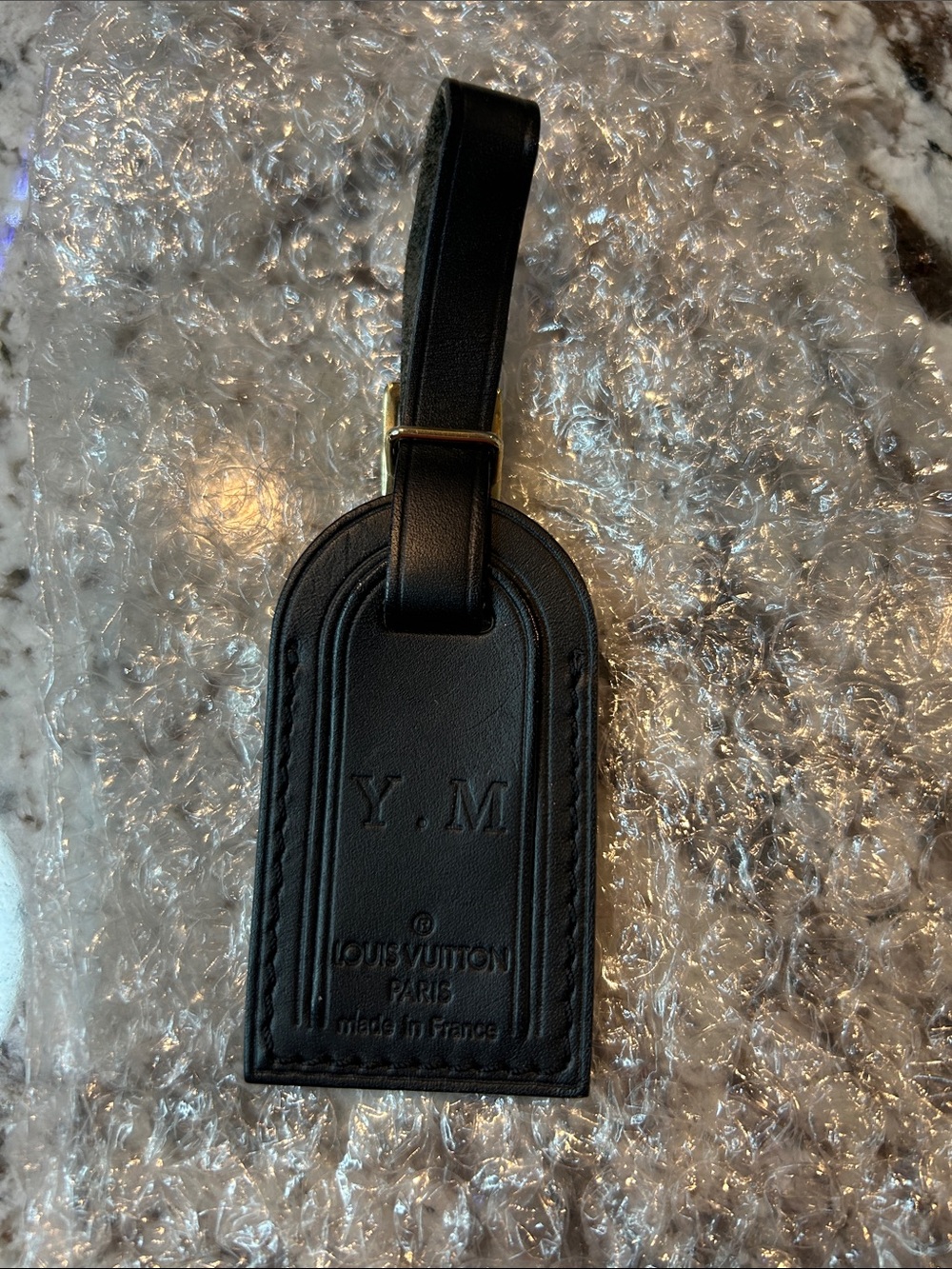 Louis Vuitton Black Leather Monogrammed mini Luggage Tag with Gold-Tone Buckle